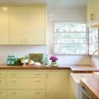 Kitchen Interior Yellow Modern Kitchen Interior Design With Yellow Painted Kitchen Cabinet And White Tile Backsplash And Wooden Countertop Kitchens Colorful Kitchen Cabinets For Eye Catching Paint Colors