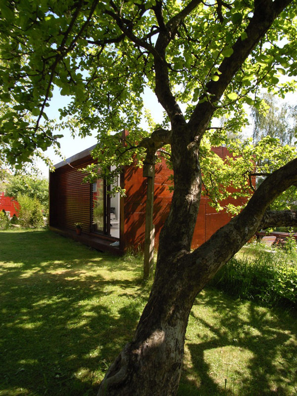 Green Trees Grass Natural Green Trees And Green Grass Yard Near Wooden Wall And Wide Glass Walls Under Flat Roof Dream Homes  Stunning Holiday House Design As Best Choice For Spending Summer Holiday