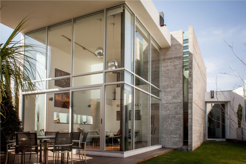 Silver Iron Above Outstanding Silver Iron Pendant Lamp Above White Sofas In Casa Villa De Loreto Residence Involved Many Glasses Windows Dream Homes Spacious Modern Concrete House With Steel Frame And Glass Elements