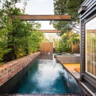 Backyard Landscape Swimming Refreshing Backyard Landscape With Long Swimming Pool Applied Brick Wall Fence At Maroon Modern Backyard Project Decoration Beautiful Modern Backyard Ideas To Relax You At Charming Home