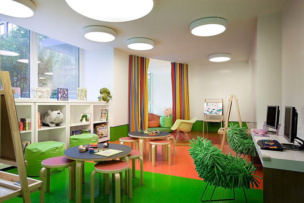 Green Accents Shagpile Refreshing Green Accents In Retro Shag Pile Chairs Child's Playroom And Homework Space Exaggerated Lighting On Glossy Floor Kids Room  Cheerful Kid Playroom With Various Themes And Colorful Design