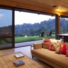 Green Field Wooden Relaxing Green Field Added With Wooden Lounge Seen From Aptos Retreat Living Room With Wooden Coffee Table Dream Homes Elegant Modern Family Retreat With Cozy Red Kitchen Colors