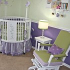 Baby Girl Enhanced Sexy Baby Girl Nursery Idea Enhanced With Purple And Green Skirted Round Crib Chair And White Nightstand Kids Room Adorable Round Crib Decorated By Vintage Ornaments In Small Room