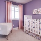 Purple Themed Interior Sexy Purple Themed Baby Nursery Interior Furnished With White Crib Bedding For Girls With Autumnal Flowers Pattern Kids Room Charming Crib Bedding For Girls With Girlish Atmosphere