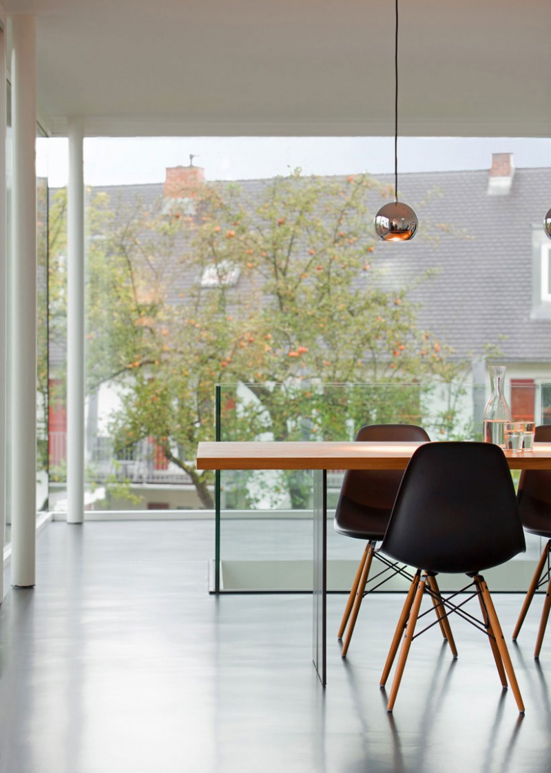 Small Iron Hanging Simple Small Iron Pendant Lamp Hanging Above Wooden Dining Desk And Decorative Dining Chairs Of The Zwischen Raum Residence Dream Homes Elegant Black And White House Looking At The Exterior And Interior Design