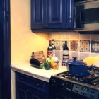 Mediterranean Kitchen Tile Sleek Mediterranean Kitchen Design With Tile Backsplash And Blue Painted Kitchen Cabinet Also Applied Hidden Lighting Kitchens Colorful Kitchen Cabinets For Eye Catching Paint Colors