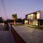 Modern W Compact Stunning Modern W House In Compact Shape With Spacious Green Yard Soft LED Light Concrete Path Rock Garden Wall Open Plan Interior Architecture Elegant Concrete Home With Spacious And Modern Style In Thailand