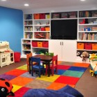 Patchwork Rug Multicolored Surprising Patchwork Rug Of Bright Multicolored Squares Built In Storage And Flat Screen TV Installed On Brown Floor Kids Room Cheerful Kid Playroom With Various Themes And Colorful Design