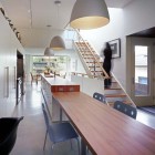 Wooden Staircase Island Terrific Wooden Staircase Beside Kitchen Island Using White Modular Pendant On White Ceiling Of Euclid Avenue House Decoration Amazing House Plant Decor With A Modern Taste In Urban Residence