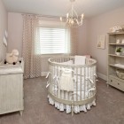 Grey And Baby Transitional Grey And Cream Themed Baby Nursery Idea Involving White Skirted Round Crib Placed On Center Kids Room Adorable Round Crib Decorated By Vintage Ornaments In Small Room