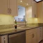 Kitchen Design Oak Transitional Kitchen Design With White Oak Cabinet Also Led Under Cabinet Lighting With Granite Countertop And A Wine Decoration Stylish Home With Smart Led Under Cabinet Lighting Systems For Attractive Styles
