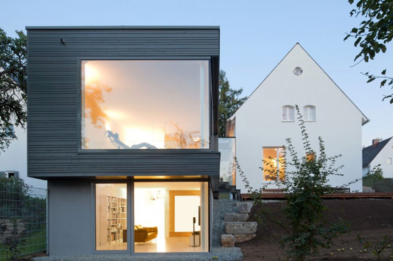 Shaped Of In Unique Shaped Of The House In Zwischen Raum Residence Furnished With Gray Wooden Glass Windows And Glass Door Apartments Elegant Black And White House Looking At The Exterior And Interior Design