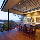 Contemporary Patio Bayview Warm Contemporary Patio Design Of Bayview House By Applying Wooden Chairs And Table Served With Romantic Bay Scenery Decoration Elegant Wood Clad House Design Blending From Modern Elements