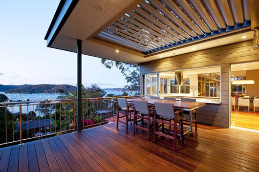 Contemporary Patio Bayview Warm Contemporary Patio Design Of Bayview House By Applying Wooden Chairs And Table Served With Romantic Bay Scenery Bathroom Elegant Wood Clad House Design Blending From Modern Elements