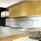 Ultra Modern Utilize Warm Ultra Modern Kitchen Designs Utilize Golden Kitchen Cabinet Set With Clear White Backsplash From Tecnocucina Kitchens Elegant Modern Kitchen Design Collections Beautifying Kitchen Interior