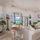 The Coral Grace Airy The Coral House On Grace Bay Living Room Interior Featured With Distressed Grand Piano With Lush Greenery Architecture Luminous Private Beach House With Stylish And Chic Exotic Interiors