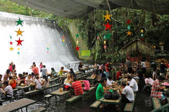 Escudero Waterfall Dining Amazing Escudero Waterfall Restaurant Including Dining Space Nearby Waterfall With Wooden Dining Table And Bench Also Stars Ornament On Ceiling Restaurant Unique Villa Design Providing Stunning Unusual Experience