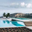 Outdoor Relaxing With Amazing Outdoor Relaxing Space Design With Several White Colored Soft Sofa And Soft Brown Wooden Bridge Hotels & Resorts Fabulous Modern Villa In Spain With White Living Room Appearance
