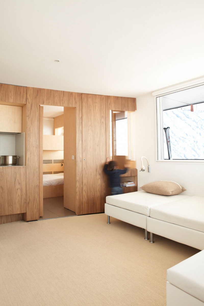 Hidden Shelves Cabin Appealing Hidden Shelves In The Cabin House With White Benches And Wooden Wall And White Ceiling Interior Design  Stylish And Contemporary Cabin Interior For Your Family