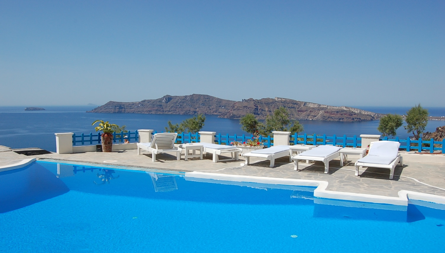 Pool Area Hotels Appealing Pool Area At Katikies Hotels In Oia With View Of Ocean Decorated With Upholstered Loungers And Planters Interior Design Classy And Elegant White Home With Breathtaking Panoramic Sea Views