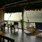 Villa Escudero Chairs Appealing Villa Escudero Including Woody Chairs And Table On The Wooden Deck With Lake Labasin View At The Outside Restaurant Unique Villa Design Providing Stunning Unusual Experience