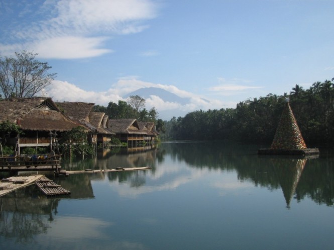 Villa Escudero Side Astounding Villa Escudero At The Side Of Lake Labasin Including Traditional Houses With Straw Roof Design With Lake And Forrest Views Restaurant Unique Villa Design Providing Stunning Unusual Experience