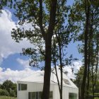View Of Vmvk Awesome View Of The House VMVK With White Wall Near The Green Grass Space And Lush Green Trees Dream Homes Chic Modern Belgian House With Elegant Interior Designs