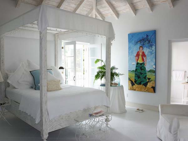 White Painted House Awesome White Painted The Coral House On Grace Bay Master Bedroom Integrating Canopy Bed With Colorful Art Architecture Luminous Private Beach House With Stylish And Chic Exotic Interiors