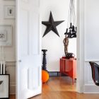 Black Star Pendants Beautiful Black Star And Flashlight Pendants Displayed As Modern Residence Interior Decorative Items Above Orange Items Dream Homes Beautiful Art Deco Home With Views Of Contemporary Interiors