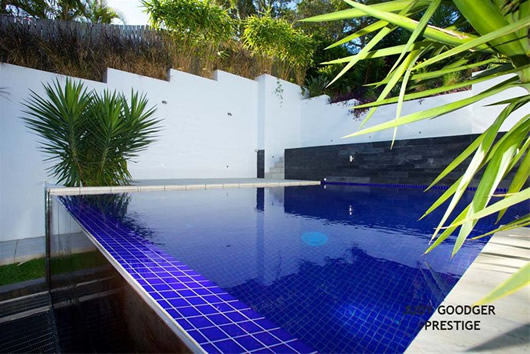 Modern Hitech Pool Bluish Modern Hitech Mansion Infinity Pool Design Applied On The Outdoor Backyard And Surrounded With Shady Ornamental Plantation Interior Design Beautiful Interior Design In Modern Hi-Tech Mansion House Of Paddington