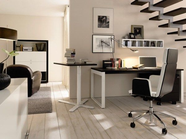 Home Office Those Breathtaking Home Office Idea For Those Who Wish To Use Space Under The Staircase With Black And White Desk And Wheel Chair Office & Workspace  Elegant And Modern Home Office Design For A Stylish Working Space