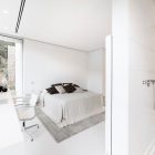 Bedroom Design Soft Captivating Bedroom Design With Several Soft Pillows White Bed Linen Grey Colored Floor Mat And White Colored Chair Hotels & Resorts Fabulous Modern Villa In Spain With White Living Room Appearance