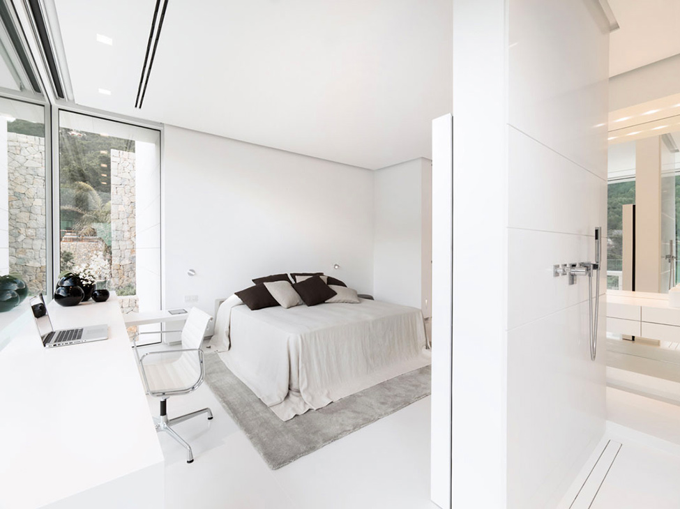 Bedroom Design Soft Captivating Bedroom Design With Several Soft Pillows White Bed Linen Grey Colored Floor Mat And White Colored Chair Hotels & Resorts  Fabulous Modern Villa In Spain With White Living Room Appearance