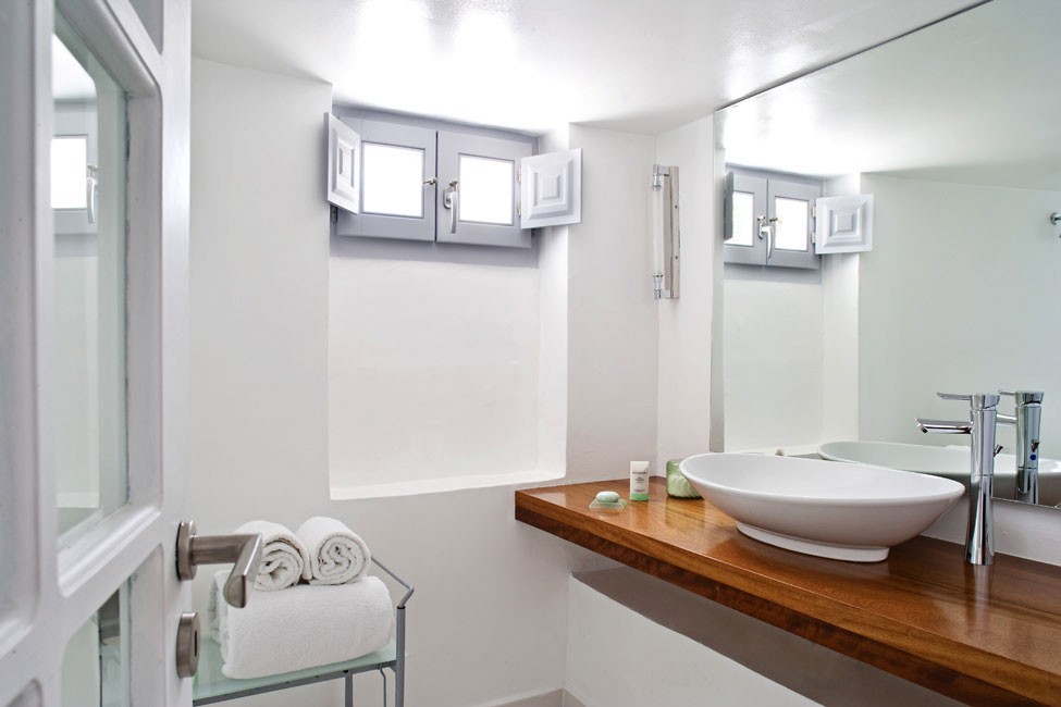 Bathroom Design Katikies Charming Bathroom Design Inside The Katikies Hotels In Oia Applied Wooden Floating Vanity With Single Sink Interior Design  Classy And Elegant White Home With Breathtaking Panoramic Sea Views