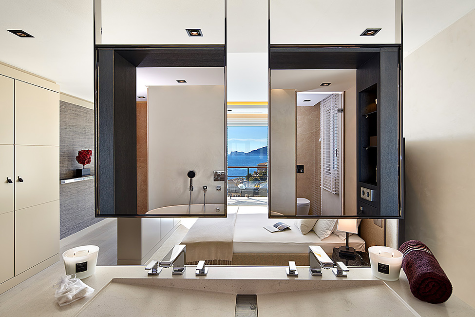 Mirrored Storage Mallorca Charming Mirrored Storage Door At Mallorca Villa Bathroom Above The Vanity With Chrome Faucet Ideas Dream Homes  Luxurious Contemporary Mediterranean Villa With Sophisticated Interior Style