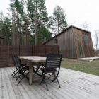 Wooden Desk Wooden Classic Wooden Desk And Black Wooden Single Chairs For Living Room Outside The House Of Chalet Lagunen Residence Dream Homes Luminous And Shining House With Contemporary Yet Balanced Color Palette