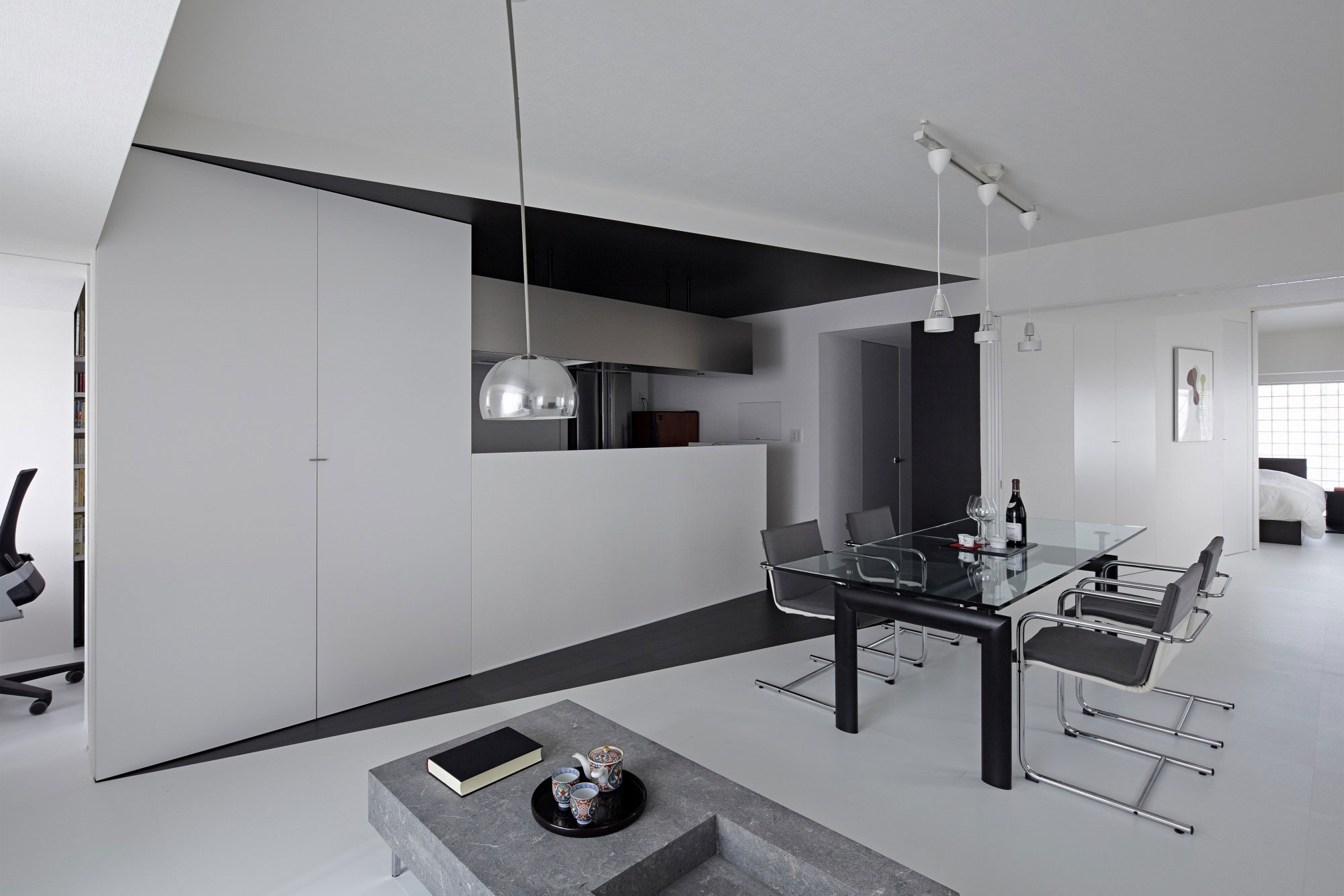 Room 407 Idea Clever Room 407 Hidden Kitchen Idea Covered By White Floor To Ceiling Divider Illuminated By Track Lamp Interior Design Elegant Monochrome Interior Idea For Classy Home Design