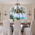 The Coral Grace Comfortable The Coral House On Grace Bay Formal Dining Room Idea Brightened By Antique Chandelier Above Table Architecture Luminous Private Beach House With Stylish And Chic Exotic Interiors