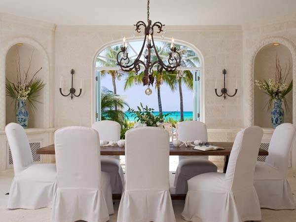 The Coral Grace Comfortable The Coral House On Grace Bay Formal Dining Room Idea Brightened By Antique Chandelier Above Table Architecture Luminous Private Beach House With Stylish And Chic Exotic Interiors
