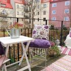 Vintage Themed Balcony Comfortable Vintage Themed Swedish Apartment Balcony Space Functions As Seating Space And Garden With Purple Splash Interior Design Cozy Scandinavian House Interior With Bright Decoration Style