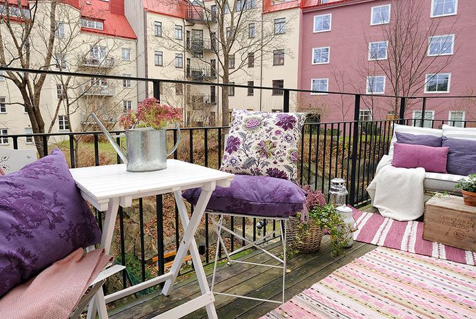 Vintage Themed Balcony Comfortable Vintage Themed Swedish Apartment Balcony Space Functions As Seating Space And Garden With Purple Splash Interior Design Cozy Scandinavian House Interior With Bright Decoration Style