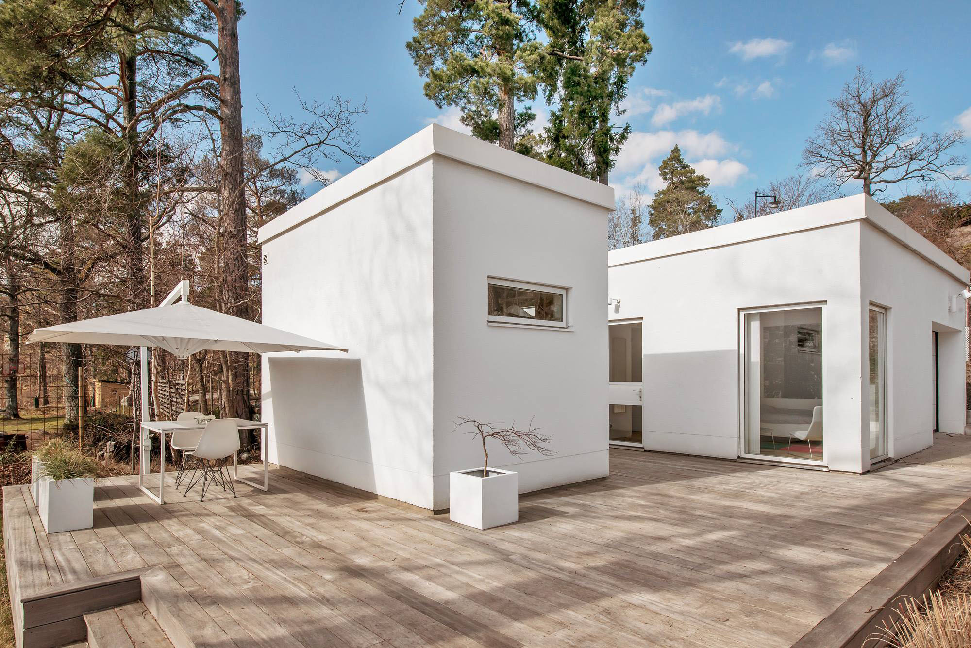 White Painted Near Cool White Painted Modern Villa Near Stockholm Pavilions Featured With Large Deck With Dining Space And Awning Dream Homes Stunningly Beautiful Villa Decorated In Modern Scandinavian Style
