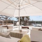 Area For Chatting Cozy Area For Gathering And Chatting Located In Modern Villa Near Stockholm Rooftop Balcony With Bright Umbrella Dream Homes Stunningly Beautiful Villa Decorated In Modern Scandinavian Style
