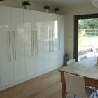 Dining Room Closet Cozy Dining Room Glossy White Closet Door 146SL Project Interior Design Fantastic Modern Interior In Luminous Wooden Accents