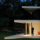 Terrace Of L Cozy Terrace Of The Villa L With Wide Glass Walls And Bright Lighting Facing The Lush Green Trees Dream Homes Stunning Duplex Modern House Surrounded By Green Tree And Lawn Made From Concrete Material
