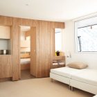 White Bench Cabin Cozy White Bench In The Cabin House With Wooden Wall And White Ceiling Above Brown Floor Interior Design Stylish And Contemporary Cabin Interior For Your Family