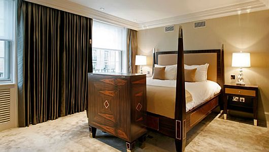 Curtain Covering Windows Dark Curtain Covering Wide Glass Windows Of Modern Bedroom In Contemporary Wilton Place Townhouse Designed In Elegant Bedroom Design Interior Design Classic Contemporary Townhouse With Blend Interior Design Style