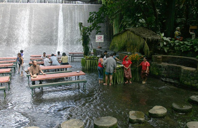 Villa Escudero Restaurant Delightful Villa Escudero Including River Restaurant With Wooden Table And Bench With Waterfall And Forrest Views In A Fresh Atmosphere Restaurant Unique Villa Design Providing Stunning Unusual Experience
