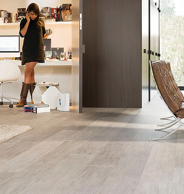 Applcation Of Floors Distinguished Application Of Modern Laminate Floors In Neutral Wooden Material In Work Office With Dar Door Design And Floating Desk Interior Design  Dazzling Wooden Floor Design For Shiny And Eco Friendly Interior