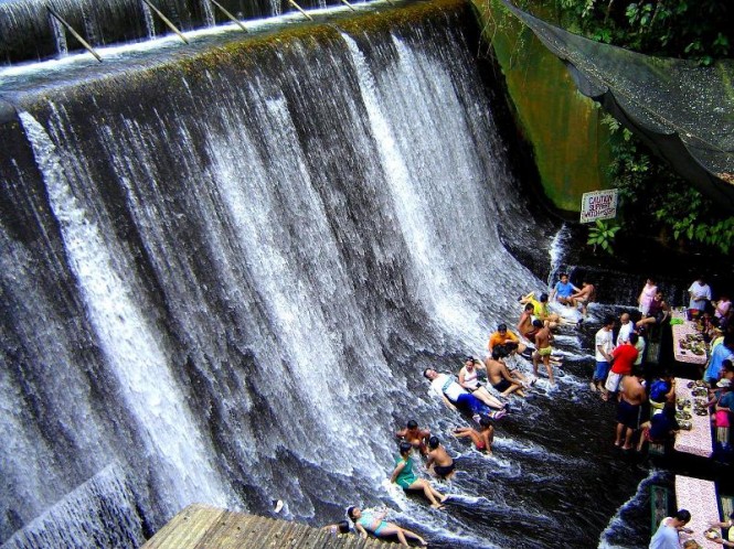 Villa Escudero Restaurant Excellent Villa Escudero Including Waterfall Restaurant In The River With Wooden Table And Bench Also Place To Enjoy The River Flows Restaurant Unique Villa Design Providing Stunning Unusual Experience